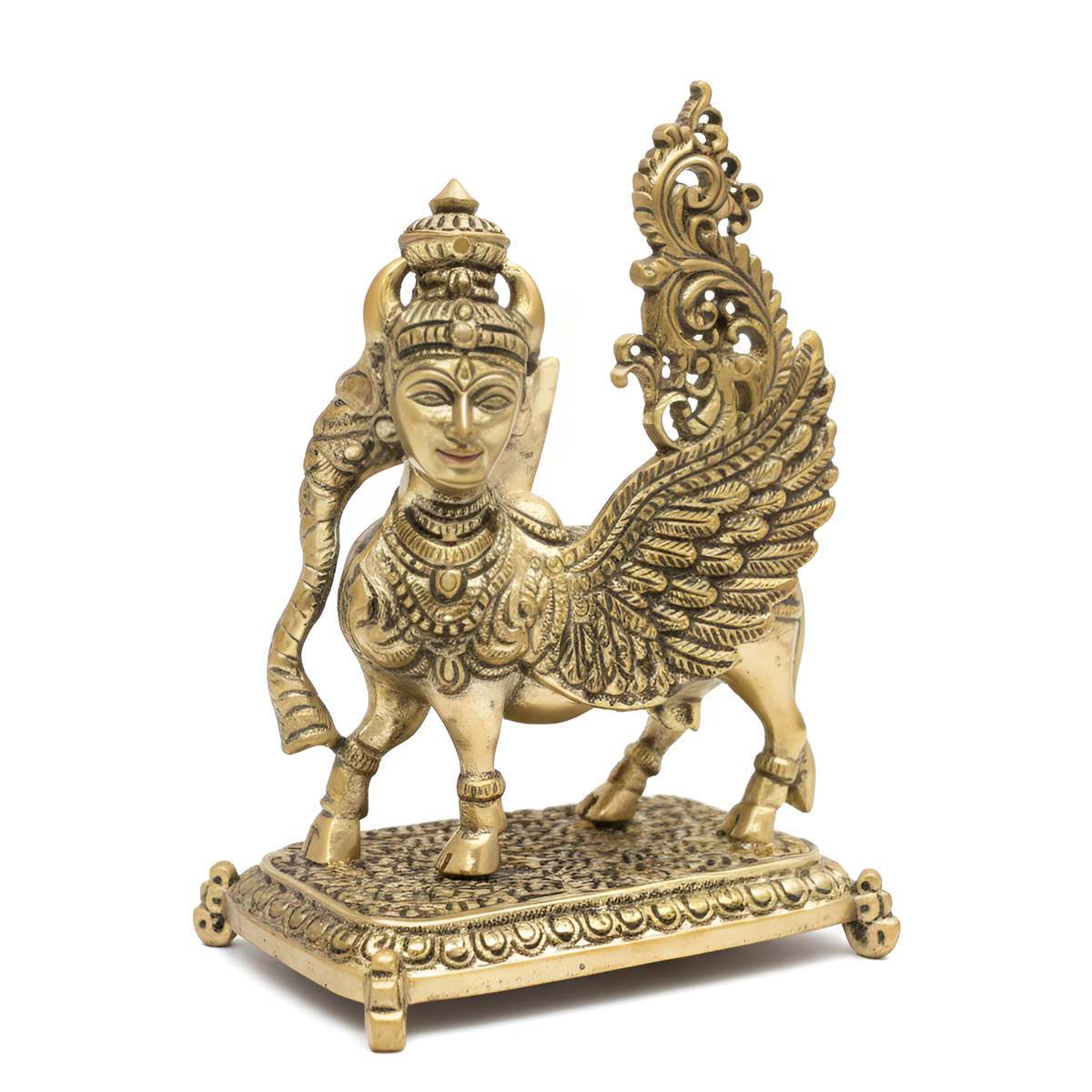 Flying Kamdhenu cow brass idol front three-quarter view isolated on white background
