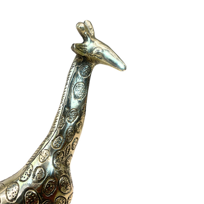 Brass giraffe idol close-up of engraved neck and head details
