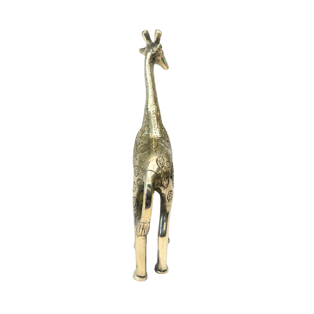 Brass giraffe idol rear view isolated on white background