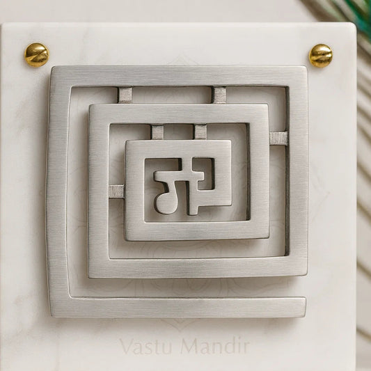 Lead Ga Vastu helix in a square spiral form displayed on a marble panel
