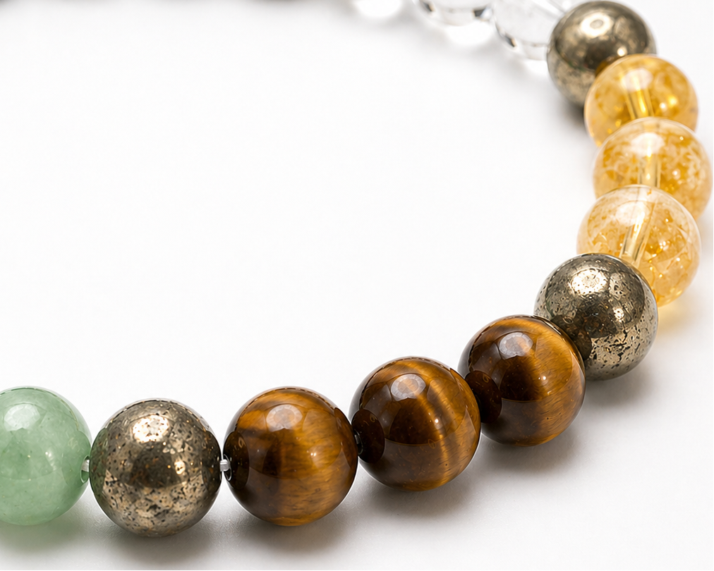 Close-up of a beaded Money Magnet bracelet with various colored beads on a white background