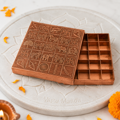 Open copper Manjusha box with partition compartments and embossed lid