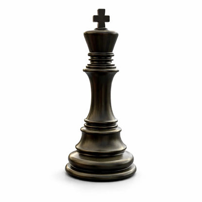 Side view of black and gold resin king chess piece sculpture