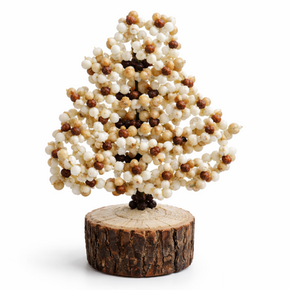 Rudraksha Gomti Chakra Tree on a white background.