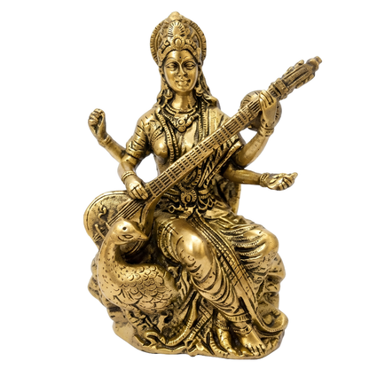 Saraswati Ji brass idol right-side view isolated on white background