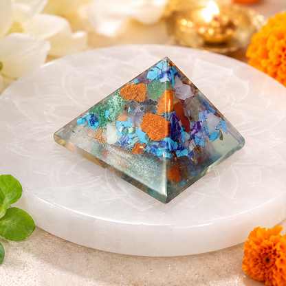 Seven Chakra Orgone Pyramid Layered Grid, orgonite – styled product display with the pyramid as the focus