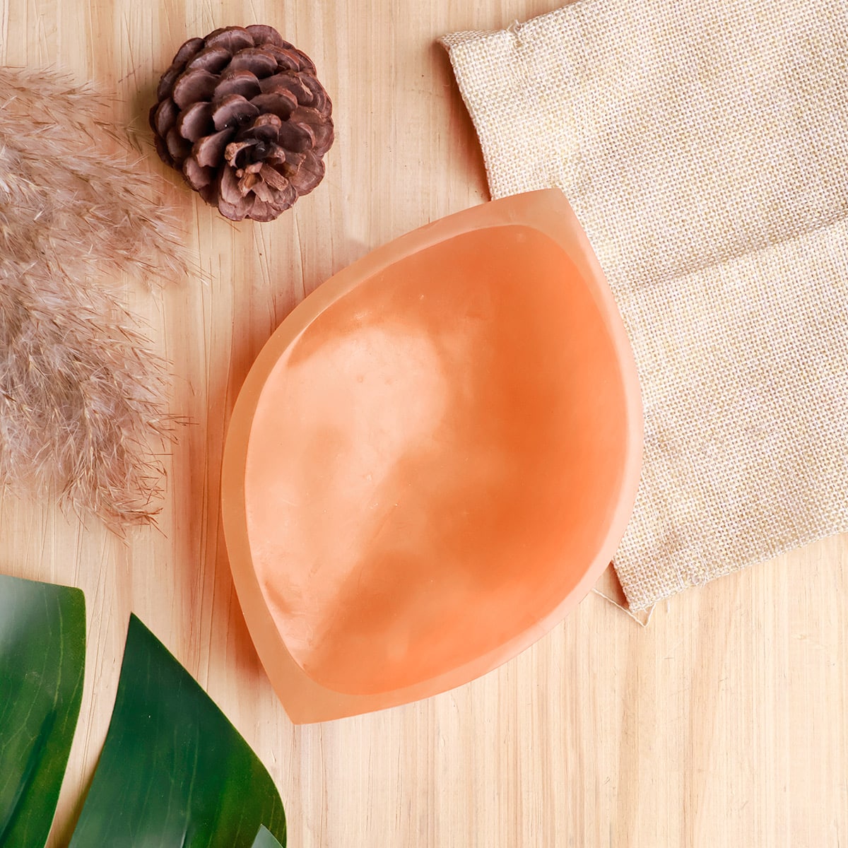 Orange divyya selenite charging bowl in another clear product photograph