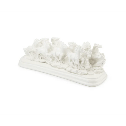 Twelve white running horses resin sculpture on a white background, left three-quarter view