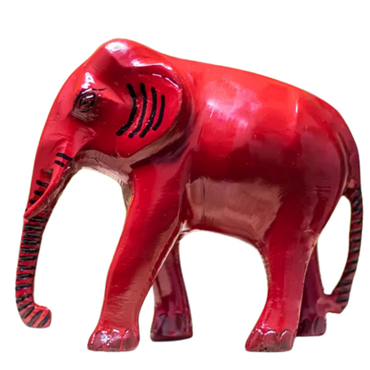 Red-finish elephant idol side view isolated on white background