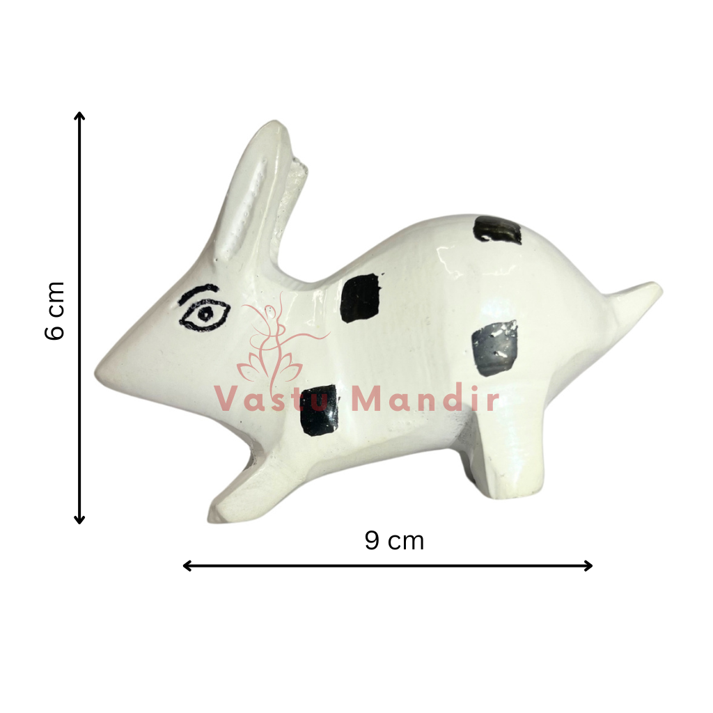White enamel rabbit pair dimension diagram showing the smaller 9 cm rabbit