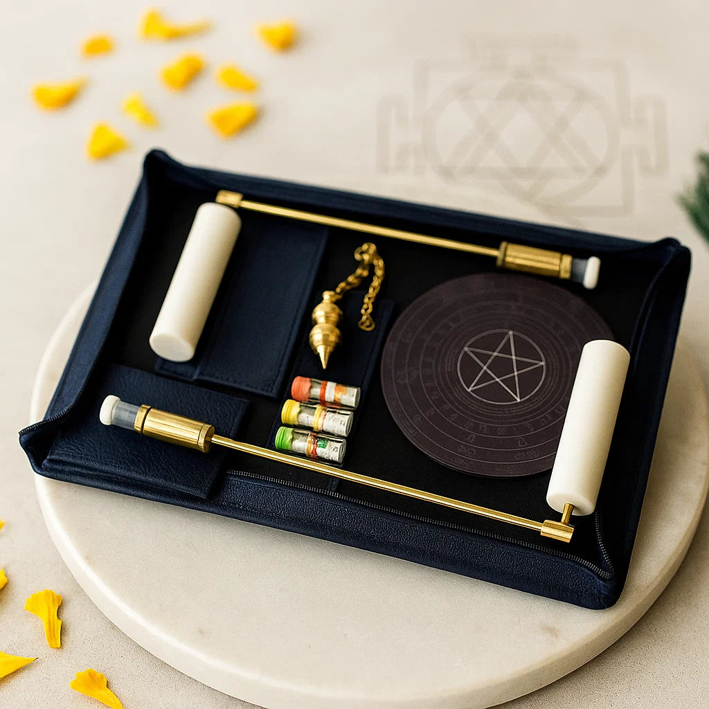Brass leather dowsing kit with L-rods, pendulum, board and sample vials in a black case