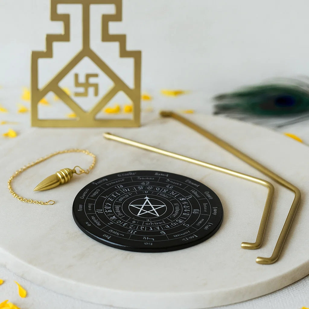 Brass L-rods, black pendulum board and brass pendulum displayed with sacred symbols
