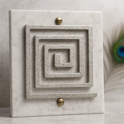 Lead plain square helix displayed upright on a marble panel