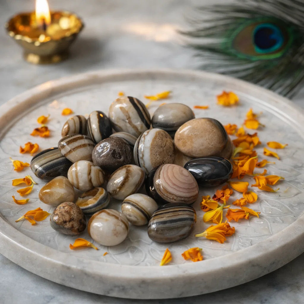 Natural sulemani hakik tumbled stones arranged in a styled spiritual setting