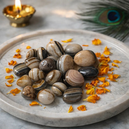 Natural sulemani hakik tumbled stones arranged in a styled spiritual setting