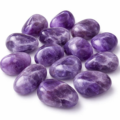 Polished purple amethyst stones grouped on a clean white background