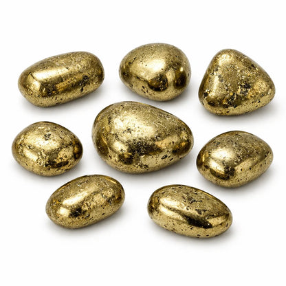 Close-up of golden pyrite tumbled stones on a clean white background showing natural colour and texture