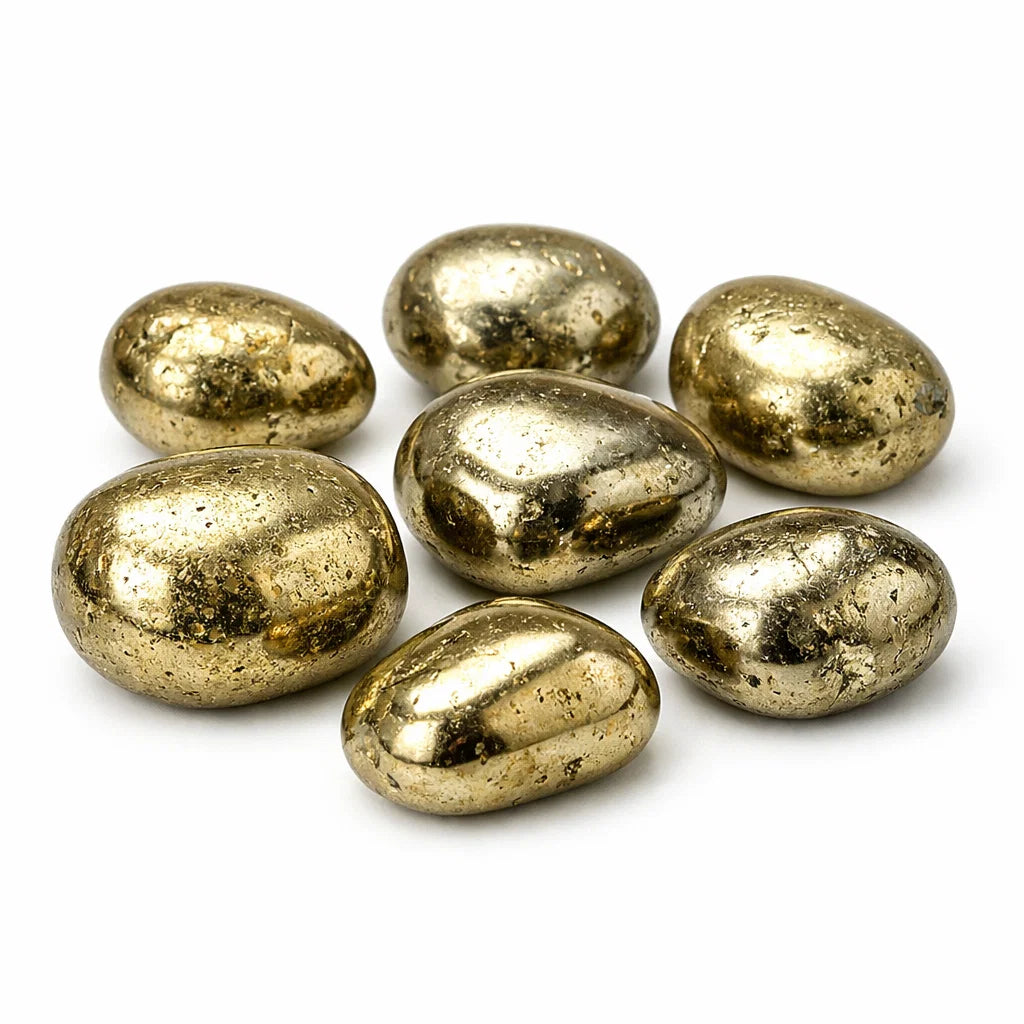Group of golden pyrite tumbled stones isolated on a clean white background