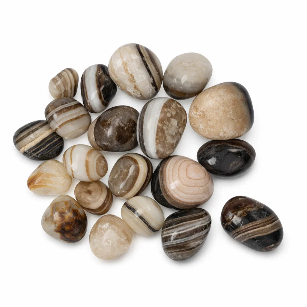 Natural sulemani hakik tumbled stones on a clean white background