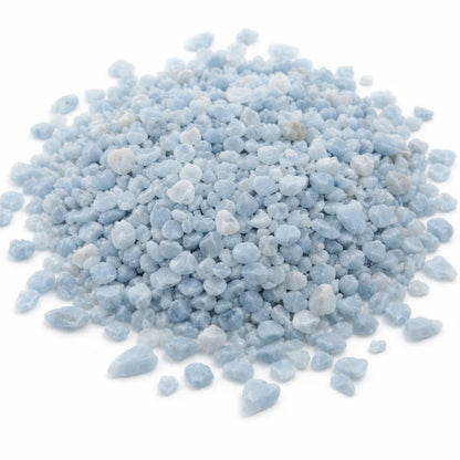 Close-up of angelite crystal chips on a clean white background showing natural colour and texture
