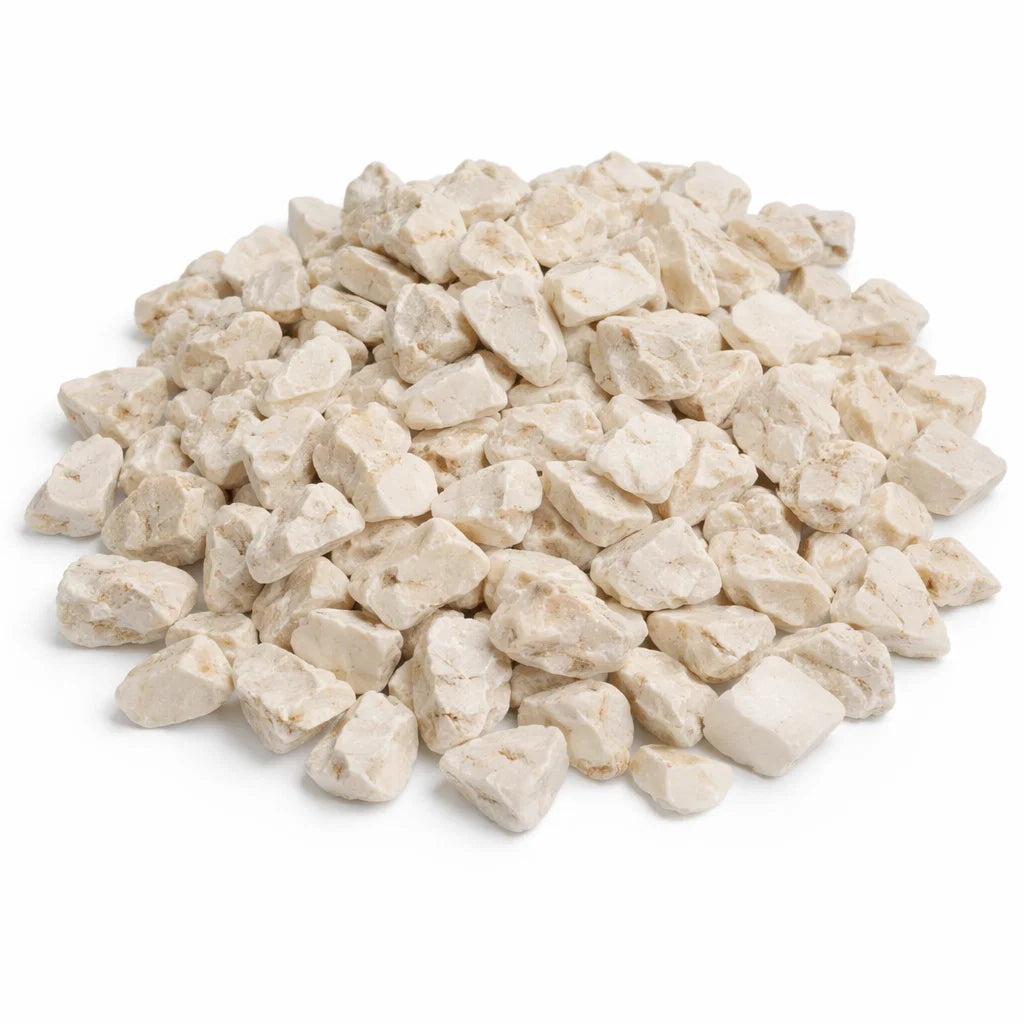 Close-up of cat's eye crystal chips on a clean white background showing natural colour and texture