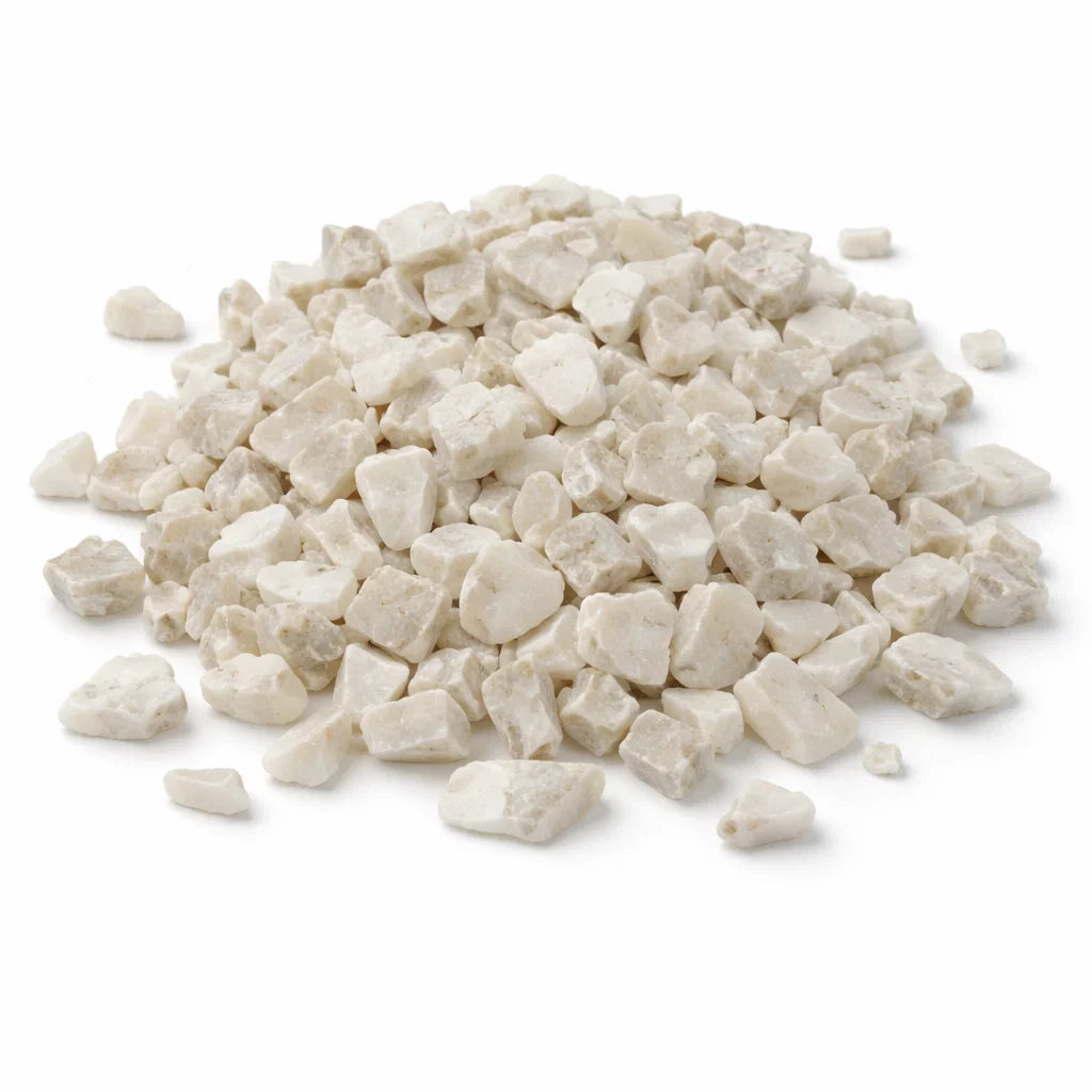 Pile of cat's eye crystal chips on a clean white background