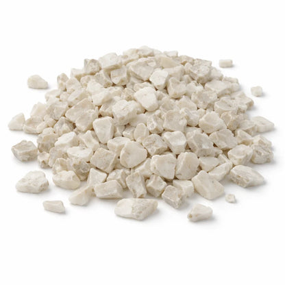 Pile of cat's eye crystal chips on a clean white background