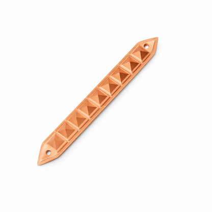 Lead pyramid strip shown with its repeating raised pattern