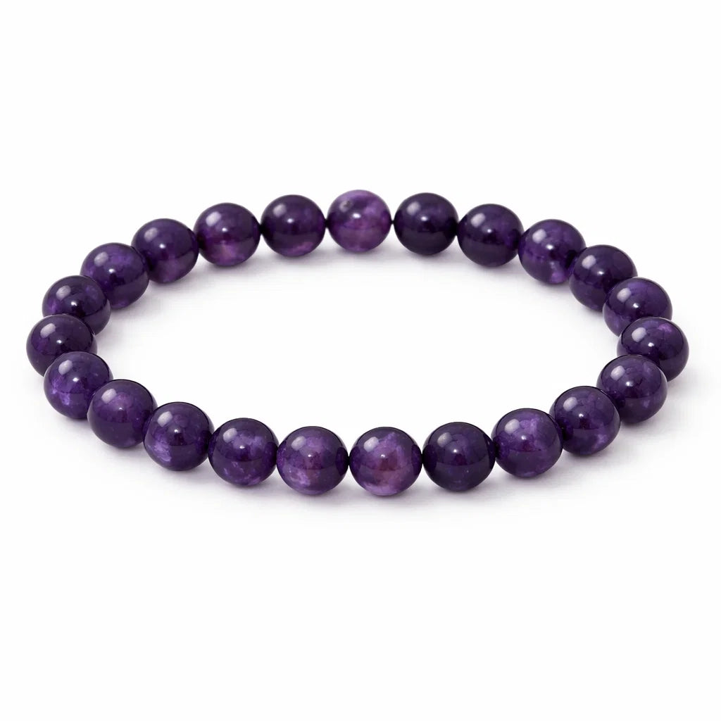 Natural amethyst crystal bracelet showing the bead colour and surface on white