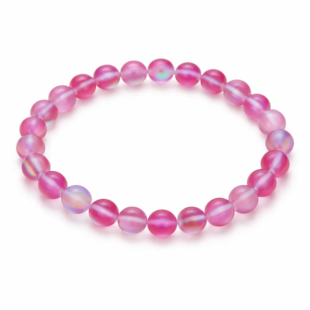 Natural light pink aura quartz crystal bracelet with round beads on a clean white background