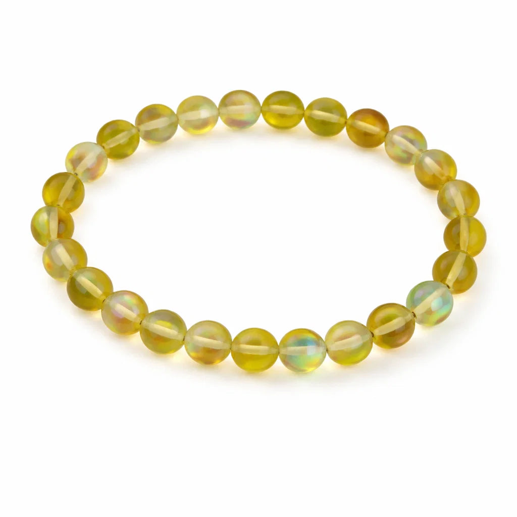 Natural yellow aura quartz crystal bracelet in a close white-background bead view