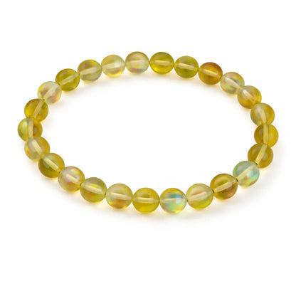 Natural yellow aura quartz crystal bracelet in a close white-background bead view