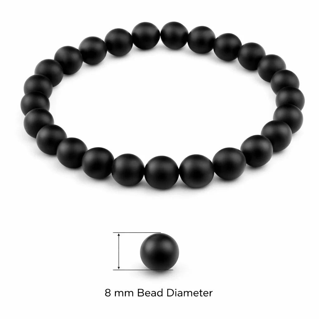 Natural black onyx crystal bracelet with round beads on a clean white background