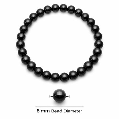 Natural black tourmaline crystal bracelet showing the bead colour and surface on white