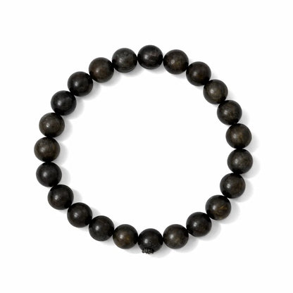 Natural bronzite crystal bracelet with round beads on a clean white background