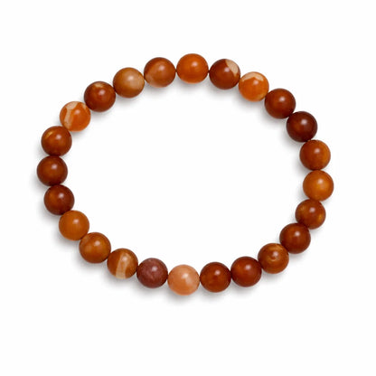 Natural carnelian crystal bracelet with round beads on a clean white background