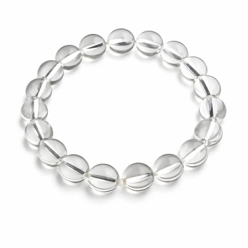 Hydro clear quartz bracelet with round beads on a clean white background