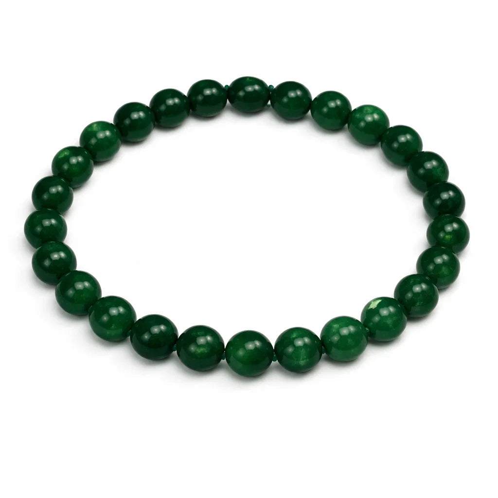 Natural green jade crystal bracelet centred in a clean product photograph