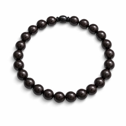 Natural garnet crystal bracelet showing the bead colour and surface on white