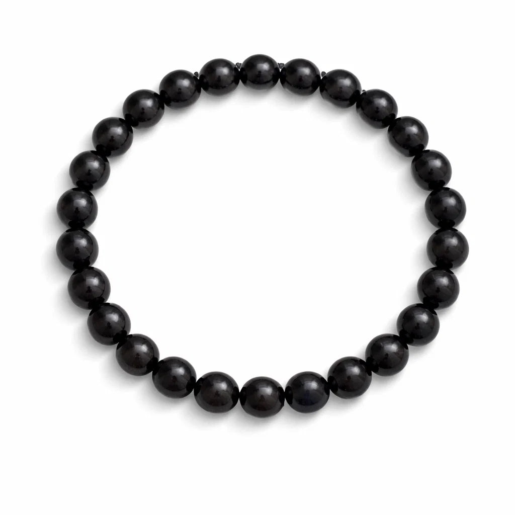 Natural garnet crystal bracelet in a close white-background bead view