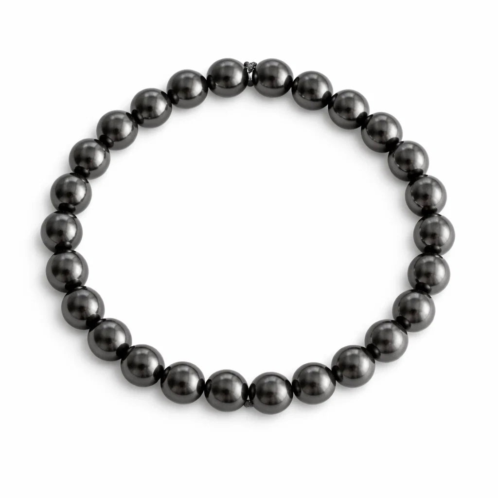 Natural hematite crystal bracelet showing the bead colour and surface on white