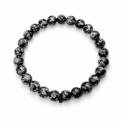 Natural snowflake obsidian crystal bracelet with round beads on a clean white background