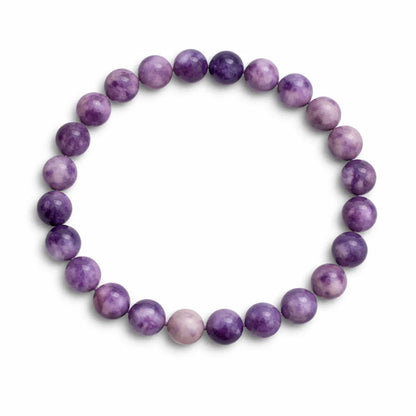 Natural lepidolite crystal bracelet showing the bead colour and surface on white