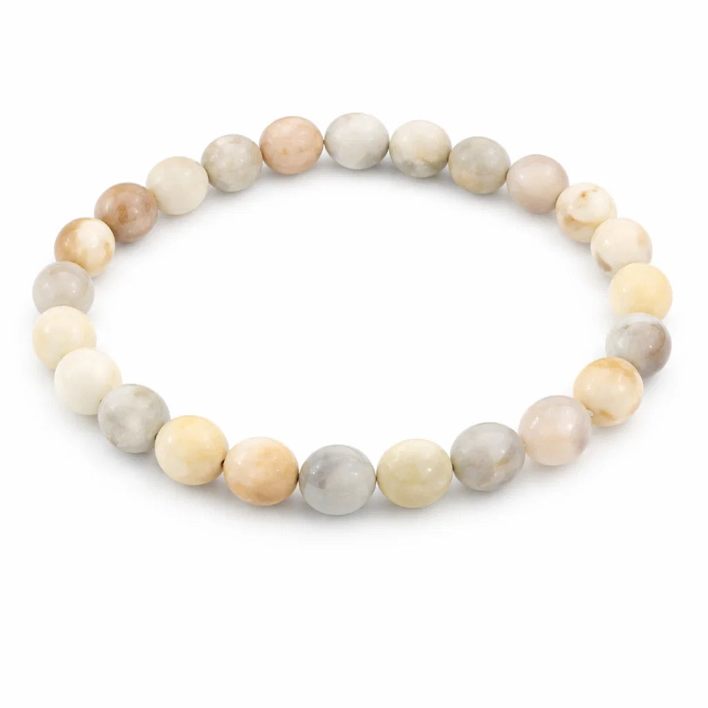 Natural multi moonstone crystal bracelet in a close white-background bead view