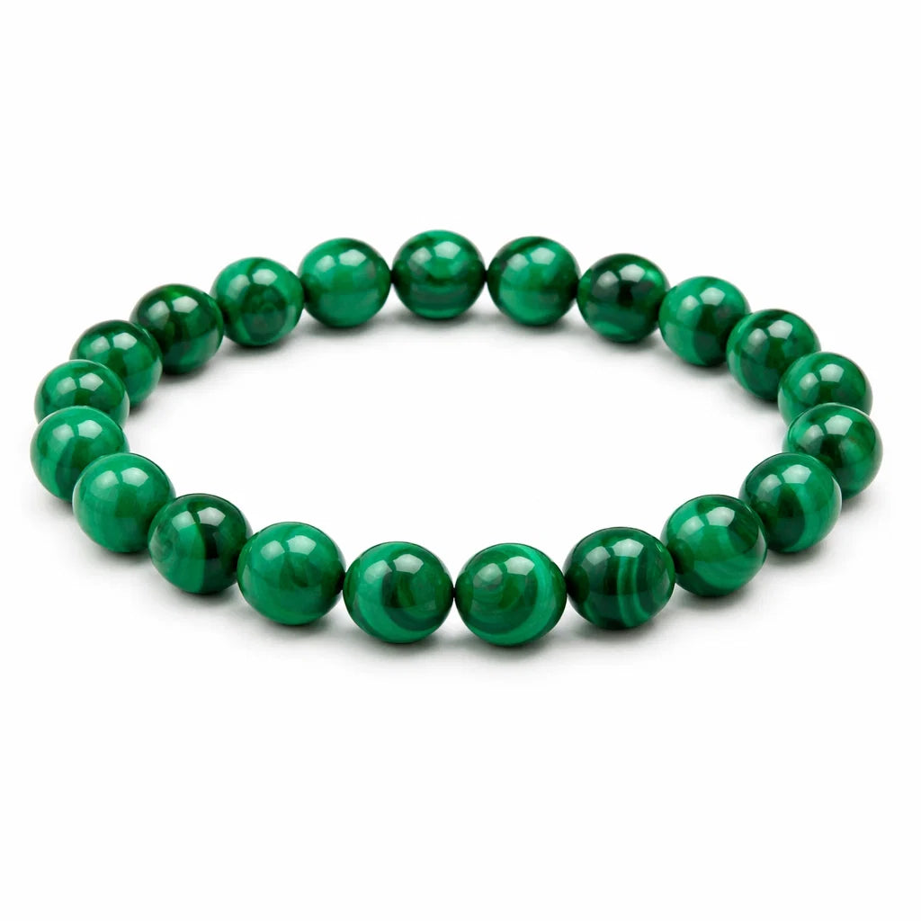 Natural malachite crystal bracelet showing the bead colour and surface on white