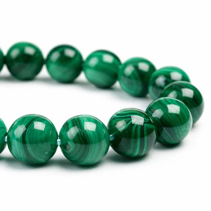 Natural malachite crystal bracelet centred in a clean product photograph
