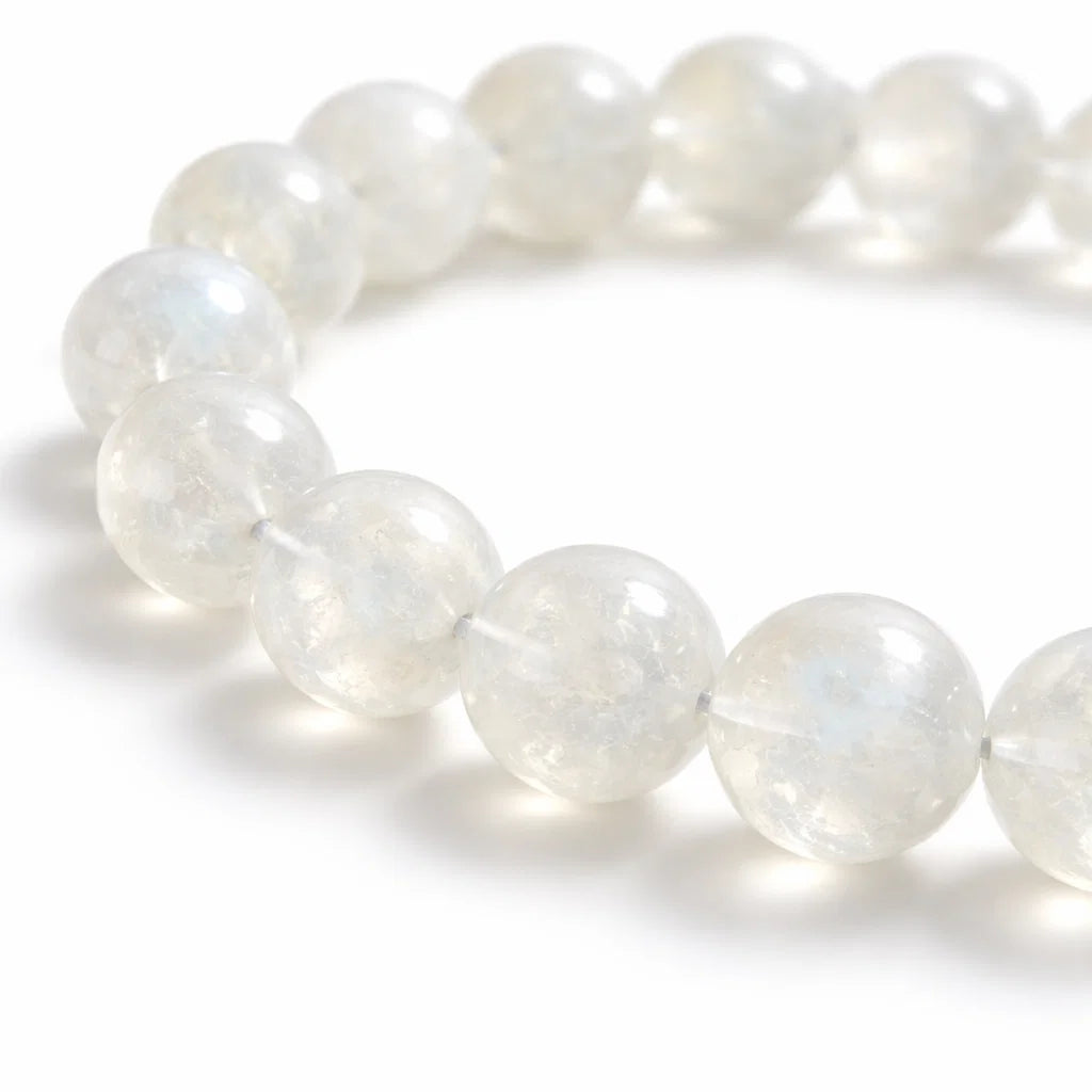 Natural white moonstone crystal bracelet with round beads on a clean white background