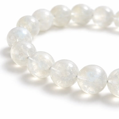 Natural white moonstone crystal bracelet with round beads on a clean white background