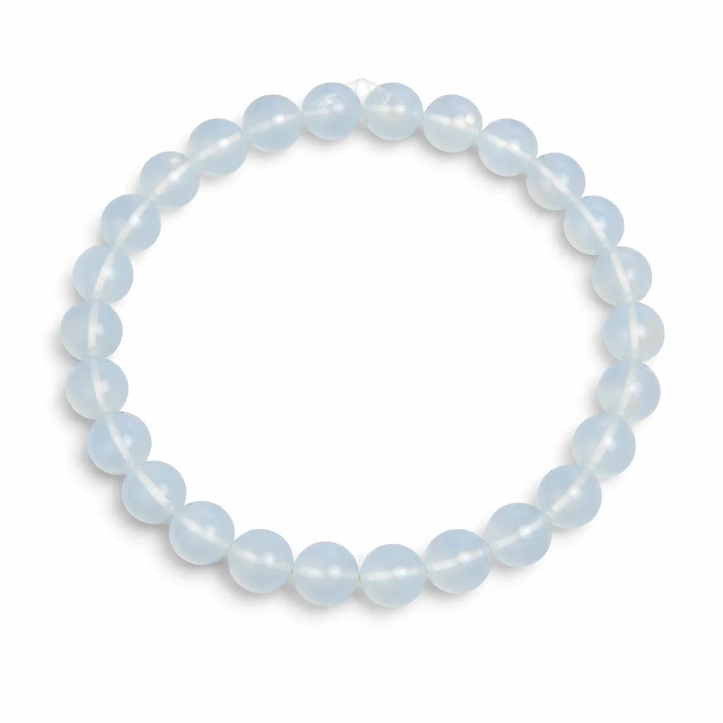 Natural opalite crystal bracelet showing the bead colour and surface on white
