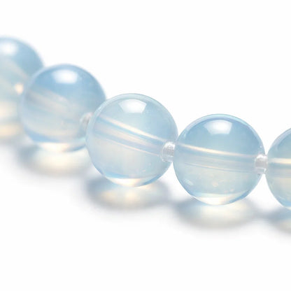 Natural opalite crystal bracelet centred in a clean product photograph